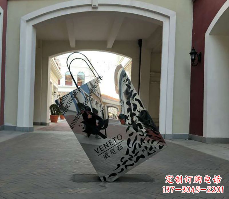 甘肃不锈钢镂空购物袋雕塑——艺术精美的装饰品