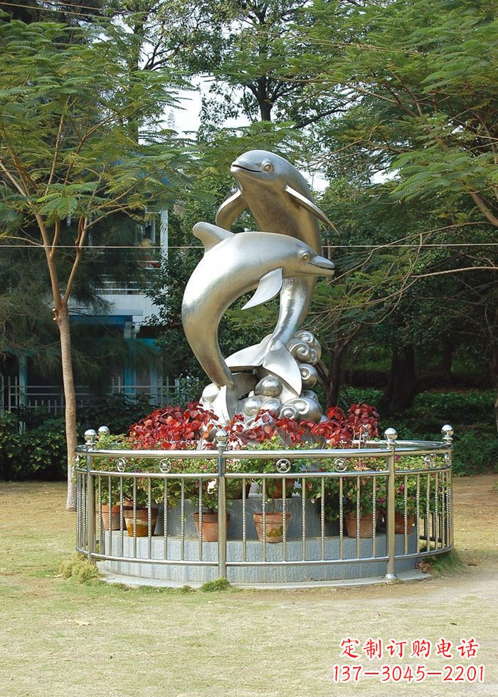 甘肃不锈钢踏浪海豚雕塑