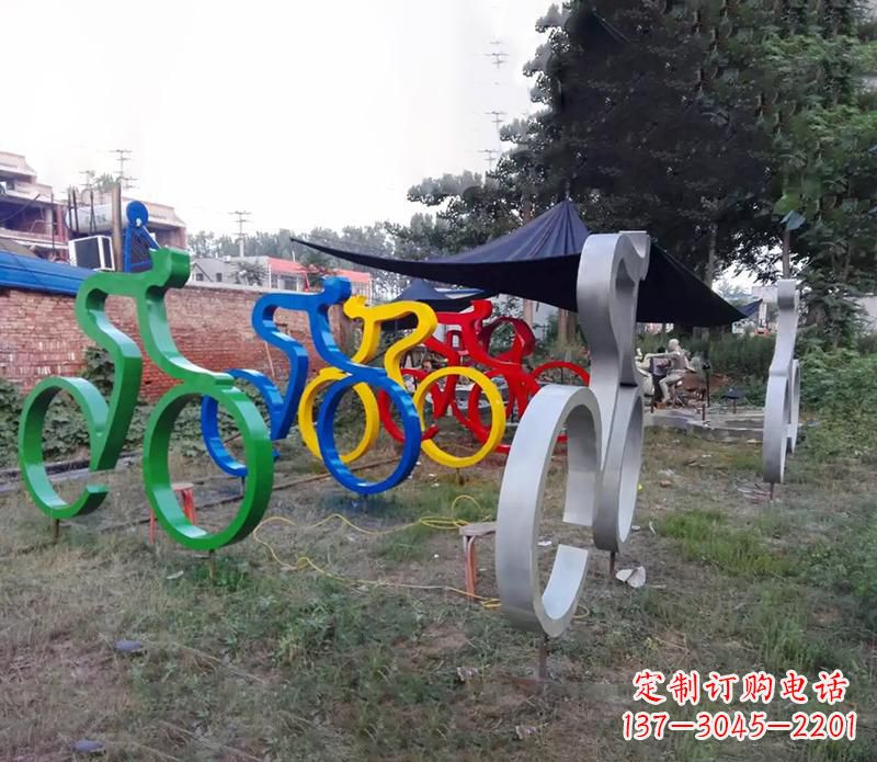 甘肃公园抽象不锈钢骑自行车雕塑