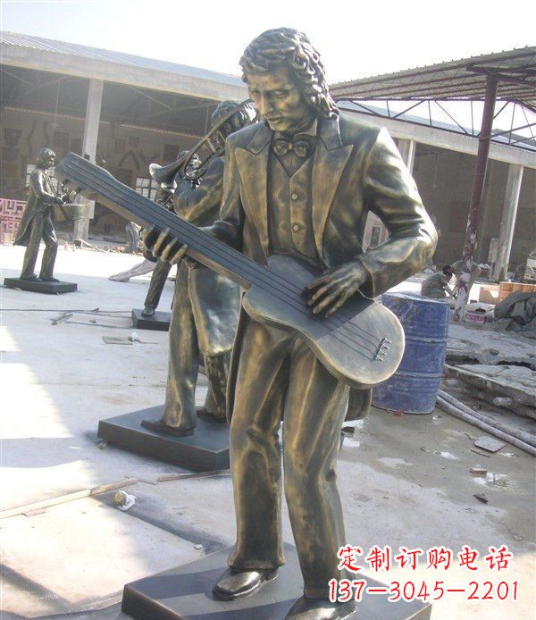 甘肃西方人物铜吉他雕塑