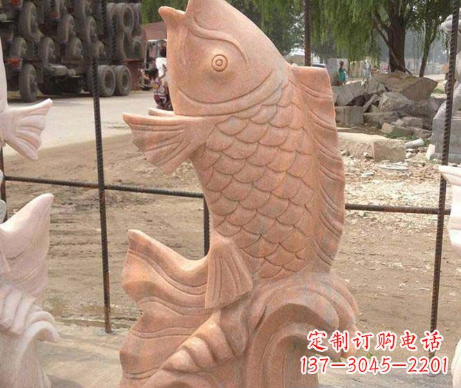 甘肃公园景观晚霞红石雕鱼喷泉