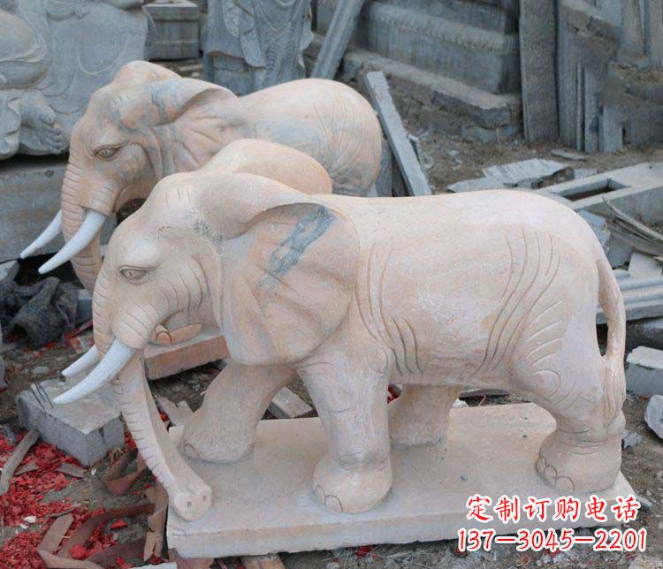 甘肃雕刻出令人感动的那头大象定制公园晚霞红大象动物石雕