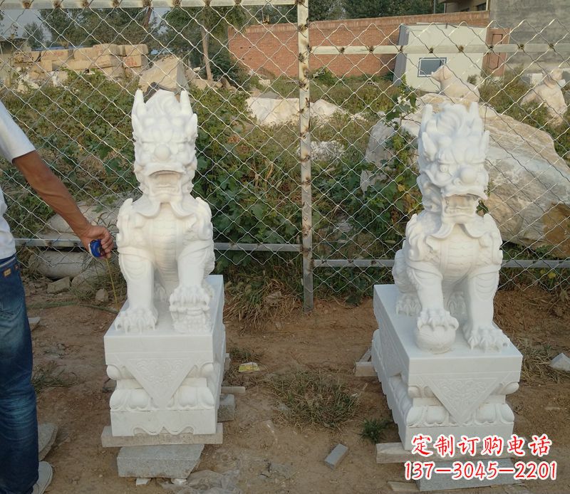 甘肃汉白玉踩球麒麟门口镇宅招财石雕