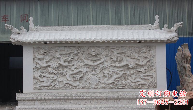 甘肃九龙壁石雕塑——让礼堂充满豪华气息