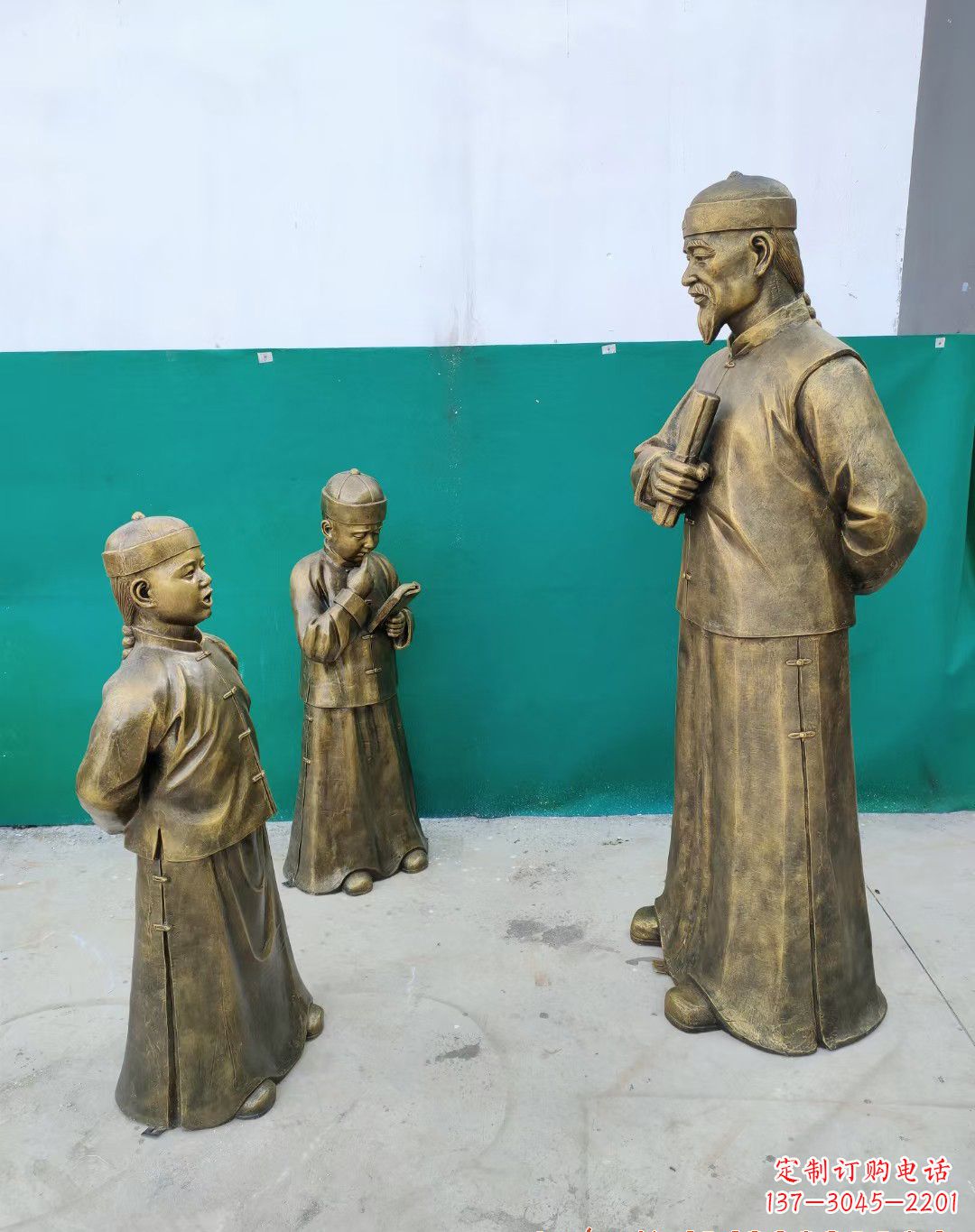 甘肃老师教导孩子铜雕