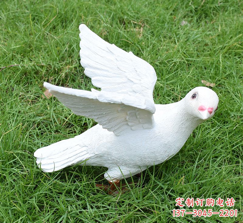 甘肃象征和平的少女和平鸽雕塑