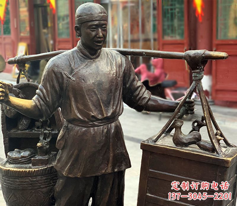 甘肃铜雕步行街卖货郎人物雕塑