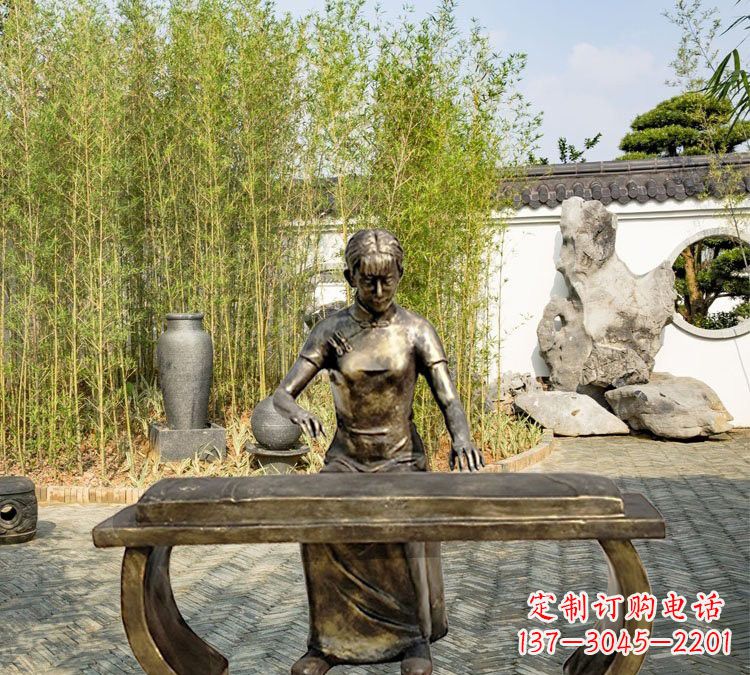 甘肃铜雕弹古筝人物