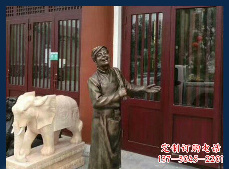 甘肃铜雕店小二酒店迎宾人物雕塑