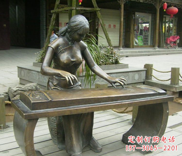 甘肃铜雕现代人物弹古筝雕塑