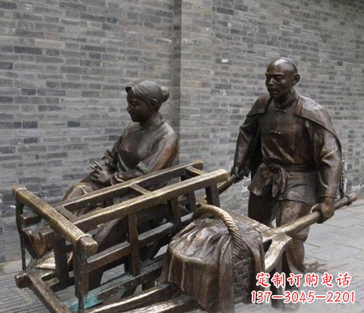 甘肃推独轮车的人物铜雕