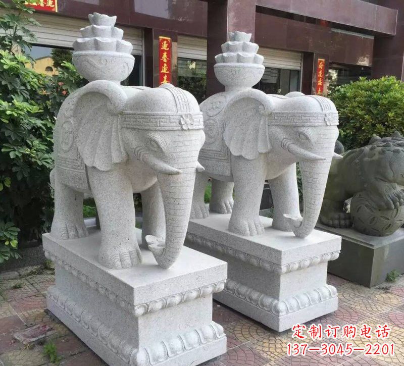 甘肃驮元宝的大象石雕