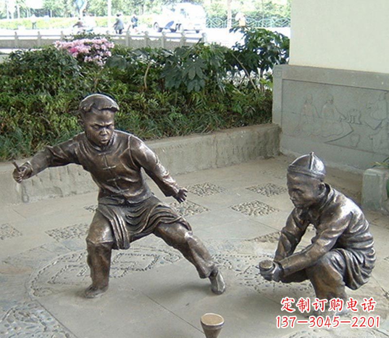 甘肃玩陀螺的古代儿童铜雕