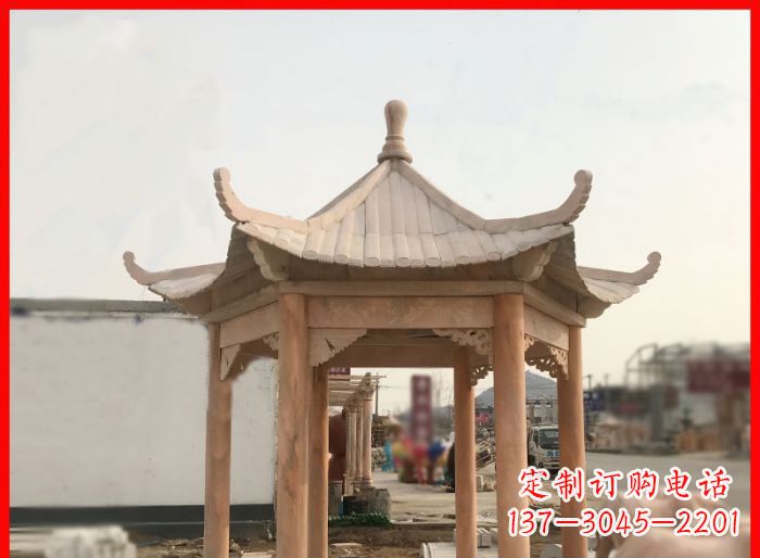甘肃晚霞红公园六角石雕凉亭