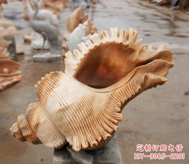 甘肃晚霞红海螺石雕广场景观雕塑