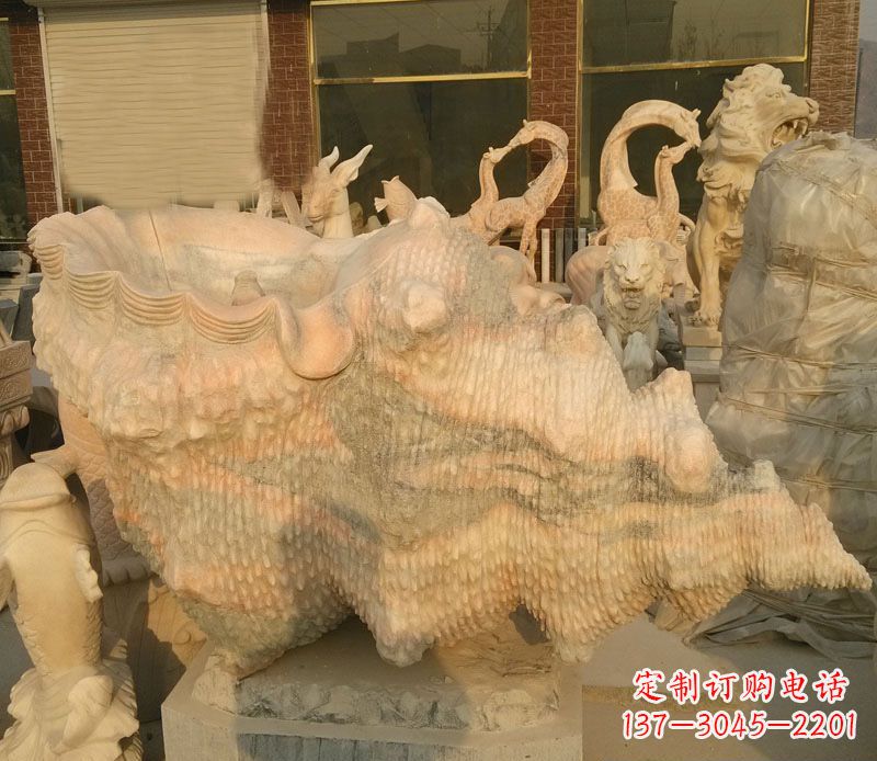 甘肃晚霞红海螺石雕