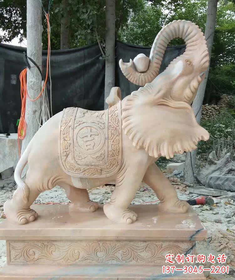 甘肃晚霞红卷元宝大象雕塑