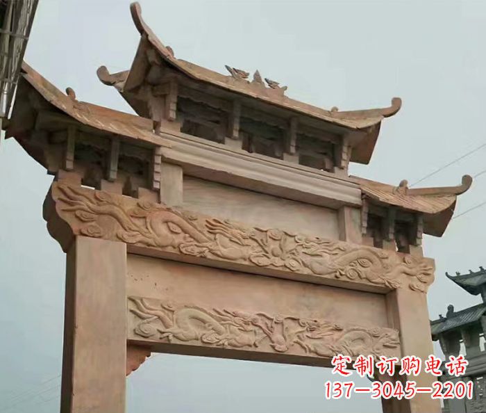 甘肃晚霞红石雕单门牌坊