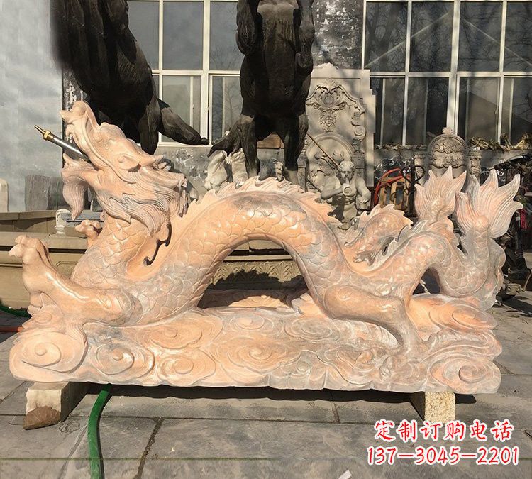 甘肃晚霞红石雕喷水龙