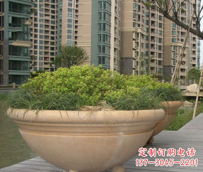 甘肃小区景观晚霞红花盆石雕
