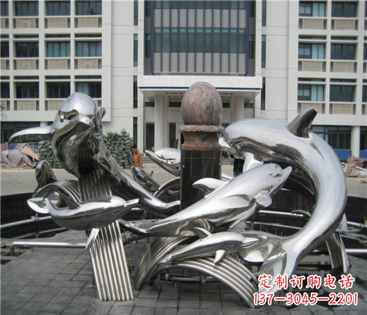 甘肃校园不锈钢海豚海浪雕塑