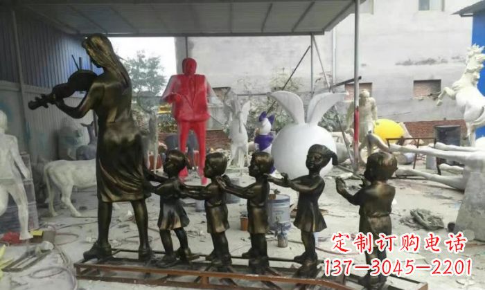 甘肃校园老师和儿童铜雕