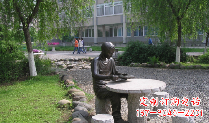 甘肃坐石桌凳看书的学生铜雕